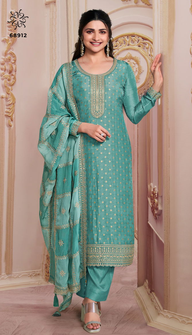 Shristi Light By Vinay Kuleesh Embroidered Dola Jacquard Salwar Kameez Suppliers In India
